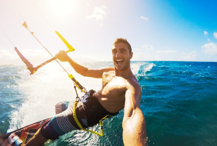 Kiteboarding. Fun in the ocean, Extreme Sport Kitesurfing. POV Angle with Action Camera